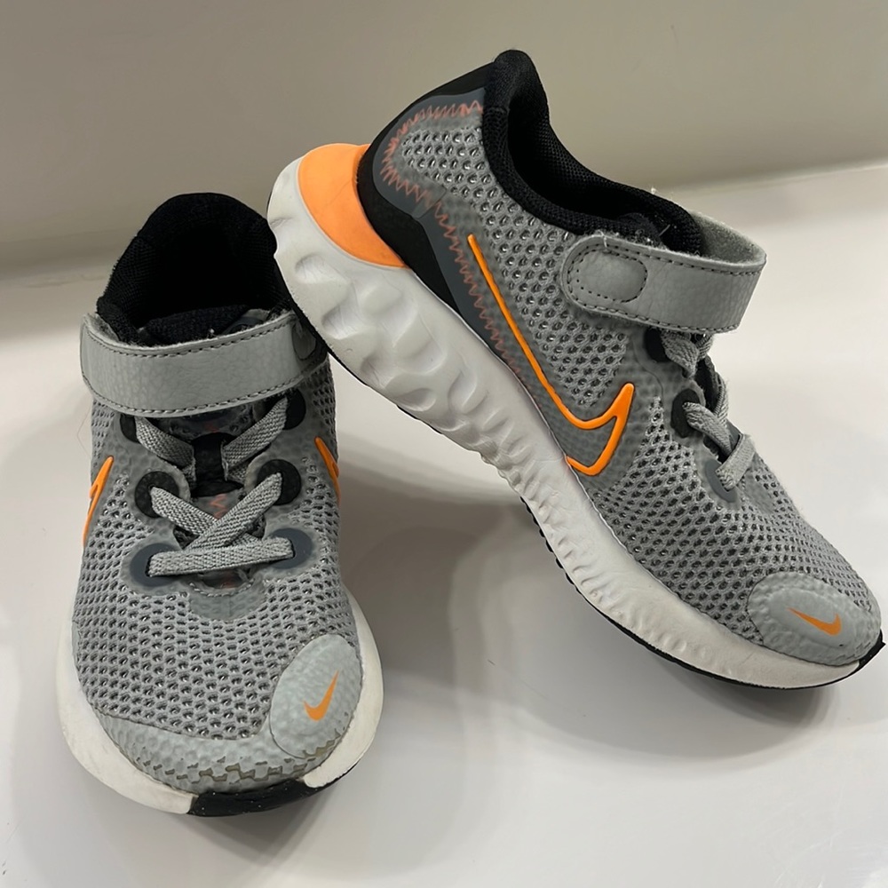 Gray and orange Nike Renew Sneakers size 11c